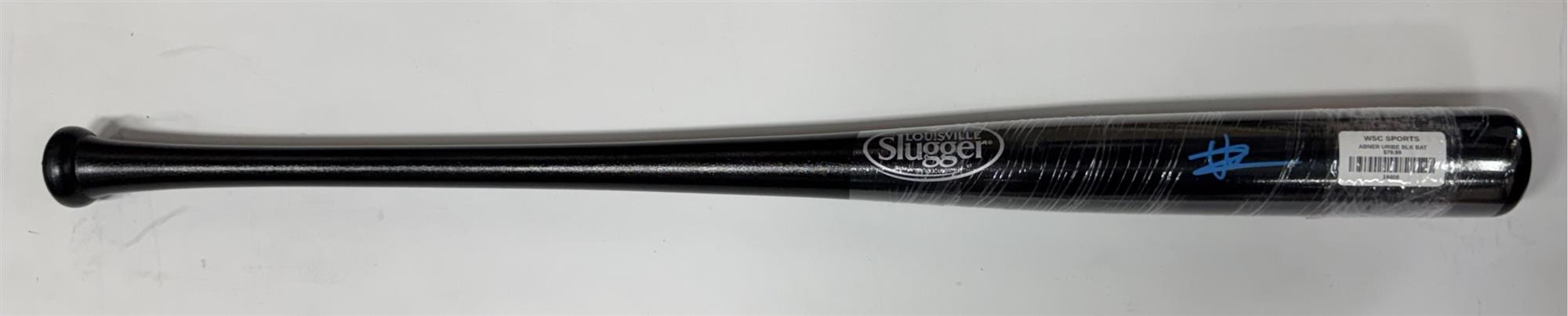 ABNER URIBE SIGNED LOUISVILLE SLUGGER BLACK BAT - BECKETT