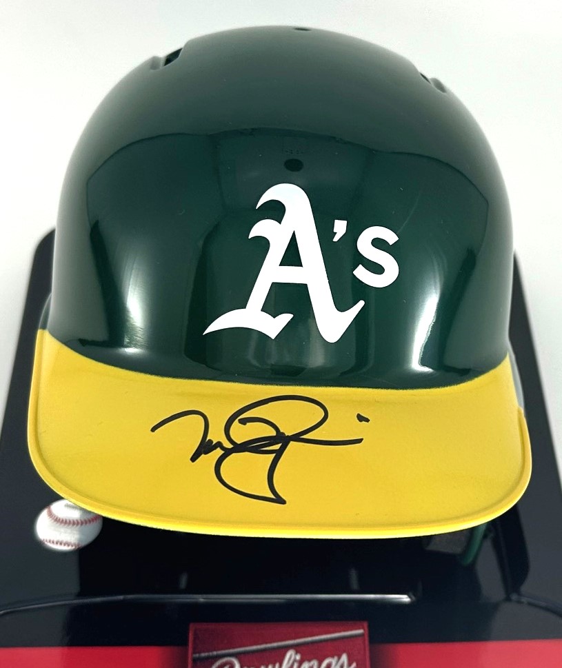 MARK MCGWIRE SIGNED RAWLINGS ATHLETICS MINI HELMET - BAS