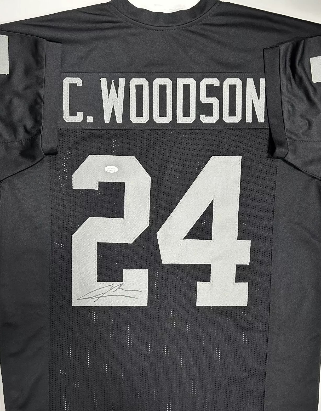 CHARLES WOODSON SIGNED CUSTOM REPLICA RAIDERS JERSEY - JSA
