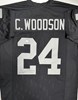 CHARLES WOODSON SIGNED CUSTOM REPLICA RAIDERS JERSEY - JSA