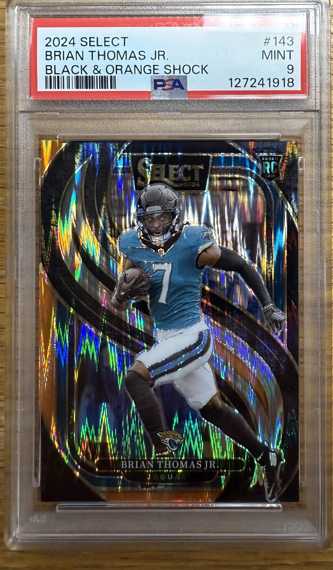 BRIAN THOMAS JR. - 2024 SELECT BLACK & ORANGE SHOCK ROOKIE CARD #334 - PSA 9