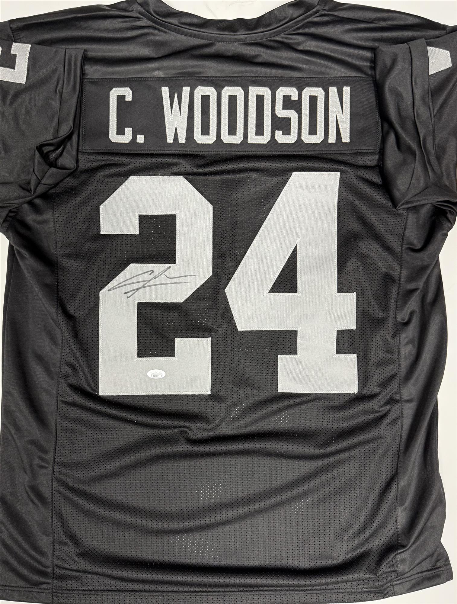 CHARLES WOODSON SIGNED CUSTOM REPLICA RAIDERS JERSEY - JSA