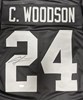 CHARLES WOODSON SIGNED CUSTOM REPLICA RAIDERS JERSEY - JSA